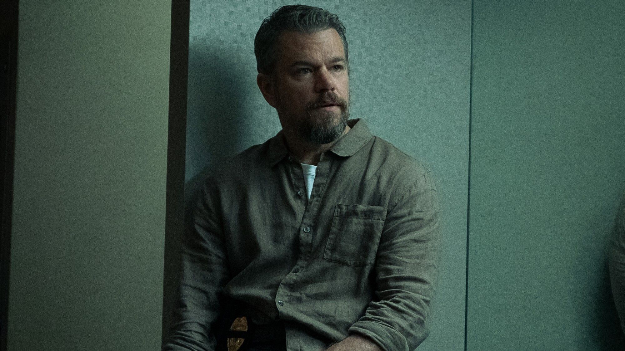 O ator Matt Damon sorrindo em um evento de cinema.