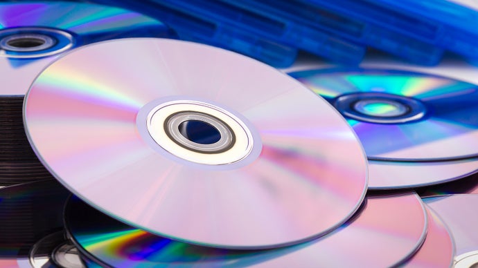 Discos físicos de jogos de PlayStation em exibição.