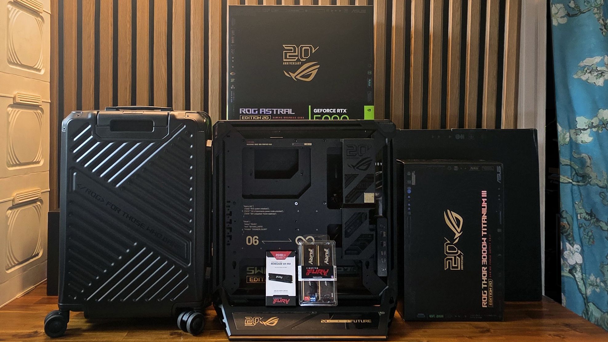 PC gamer Asus ROG Edition 20 com gabinete aberto e múltiplas telas